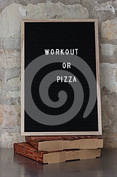 Letterboard with workout or pizza