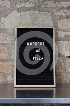 Letterboard with workout or pizza