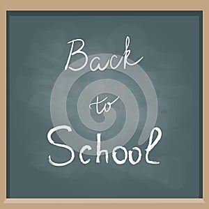 Lettering Back to School on blackboard