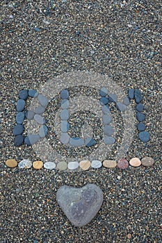 Lettering BLM Black lifes matter made from stones.. Concept of stopping racism