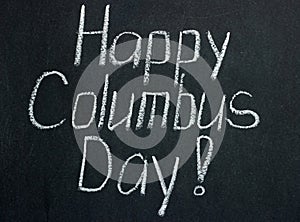 Lettering on a chalkboard Happy Columbus Day!