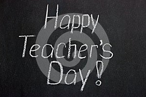 Lettering on a chalkboard Happy Teacher`s Day