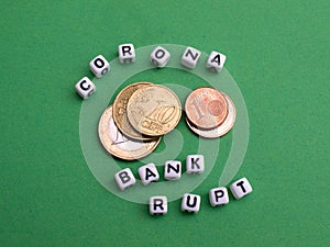 Lettering Corona Bankrupt with Euro pieces
