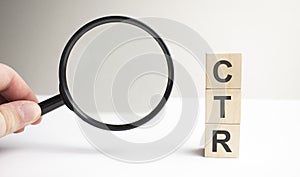 Lettering ctr on wooden cubes on a gray background