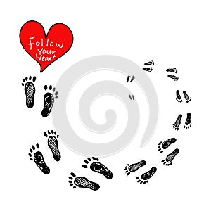 Lettering `Follow your heart` with footprints.