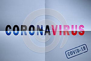 Lettering on paper `Coronavirus` close up