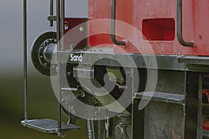 lettering "sand" on an old shunting locomotive, there the sand was filled in