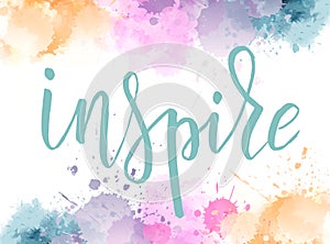 Lettering on watercolored background. Inspire.