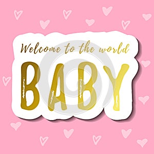 Lettering of Welcome to the world baby in golden gradient with white outline and shadow on pink background with hearts