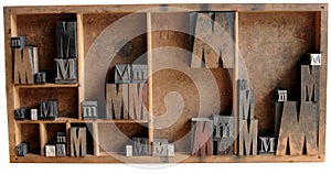 Letterpress M in wood and meta photo