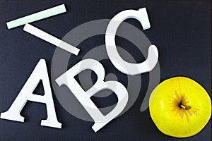 Letters ABC and chalk board