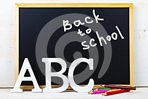 Letters ABC and chalk board