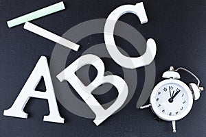 Letters ABC and chalk board