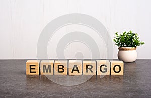 word embargo made with wood building blocks