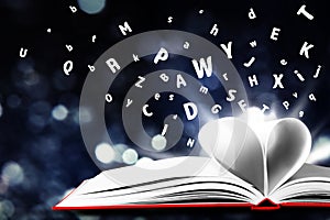 Letters flying out from open book on dark background, closeup. Bokeh effect