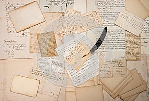 Letters, handwritings, vintage postcards and feather pen