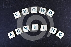 Letters making the words crowd funding