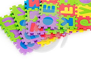 Letters and numbers colourful puzzle for children play. Soft toy