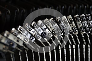 Letters and numbers in the typo of a old qwerty typewriter