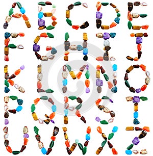 Letters spelled with semiprecious stones photo