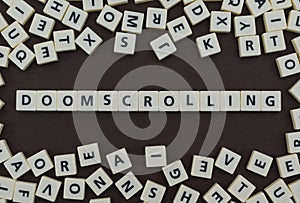 Letters spelling out doomscrolling