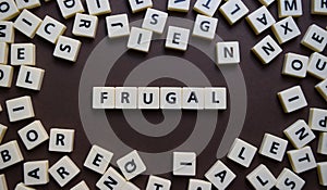 Letters spelling out frugal