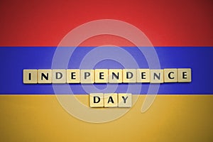 Letters with text independence day on the national flag of armenia.
