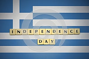 Letters with text independence day on the national flag of greece.