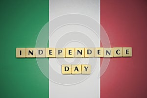 Letters with text independence day on the national flag of italy.