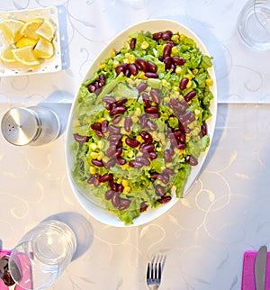 Lettuce and bean salad on a table