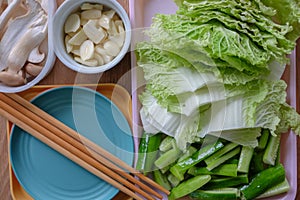 Lettuce, Eryngii Mushroom, cucumber, and garlic, side dishes of Korean Barbecue, Korean traditional grilled BBQ food