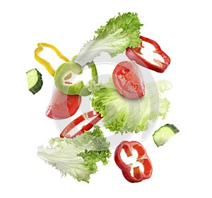 Lettuce leaves, cut cucumber and tomato falling on white