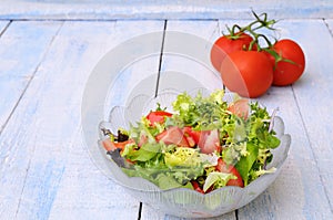 Lettuce and tomato salad.