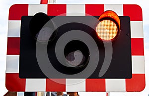 Level crossing lights signalling to stop