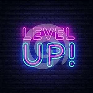 Level Up Neon Text Vector. Level Up neon sign, design template, modern trend design, night neon signboard, night bright photo