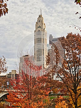 The LeVeque Tower with fall colors and stormy clouds Columbus ohio USA