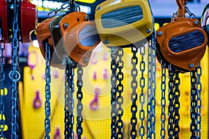 Lever winch. Tal lever. Manual chain hoist. Shallow depth of field. Focus on Chain Link