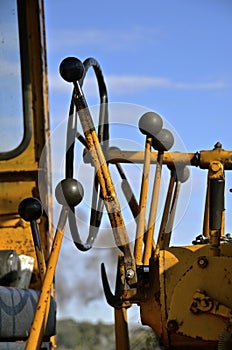 Levers of a road grader