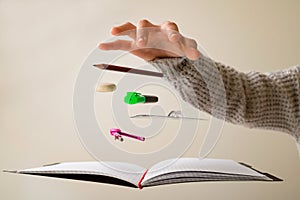 Levitating school supplies for math - notebook, pen, ruler, pencil, divider and eraser on yellow background. Concept of education