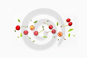 Levitation cherry fruit composition isolated on white background. Flat lay, top view, copy space