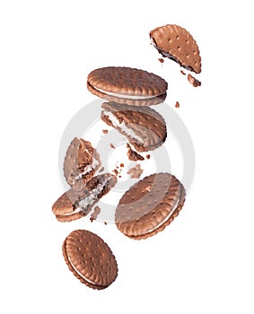 Levitation of chocolate crispy cookies in the air isolated on a white background