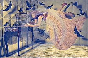 Levitation shot of a Woman and Her Black Birds