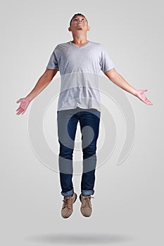 Levitation. Young Man Walking Jumping on Air