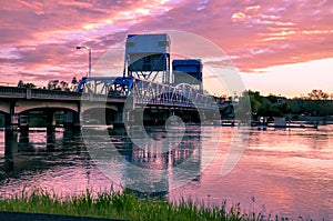 Lewiston - Clarkston blue bridge against vibrant twilight sky. Idaho and Washington states border