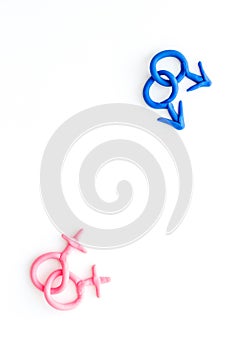 LGBT concept. Male and female symbols on white background top-down copy space