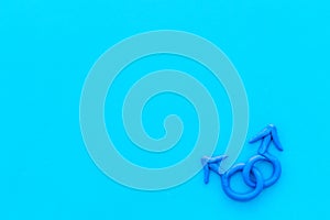 LGBT concept. Male Mars symbol on blue background top-down copy space