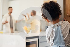 Lgbt, divorce and girl child watching gay parents argue in kitchen with stress, worry or fear in their home. Family