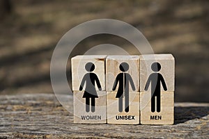 Symbol of people who identify themselves with different sexual preferences, which is used to identify a bathroom, in wooden cubes