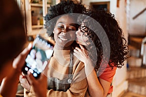 LGBT Lesbian couple love happiness concept. Homosexual women hugging and enjoying time together.