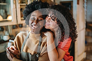 LGBT Lesbian couple love happiness concept. Homosexual women hugging and enjoying time together.